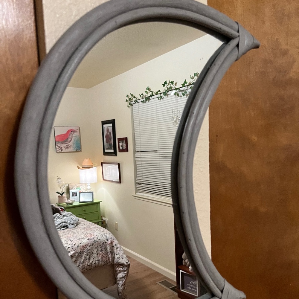 Moon shaped mirror